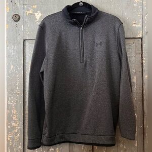 Men’s Under Armour quarter zip golf pullover. Medium